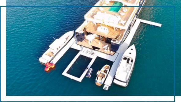 A custom Super Dock on superyacht Ulysses providing a modular docking solution for multiple superyacht toys