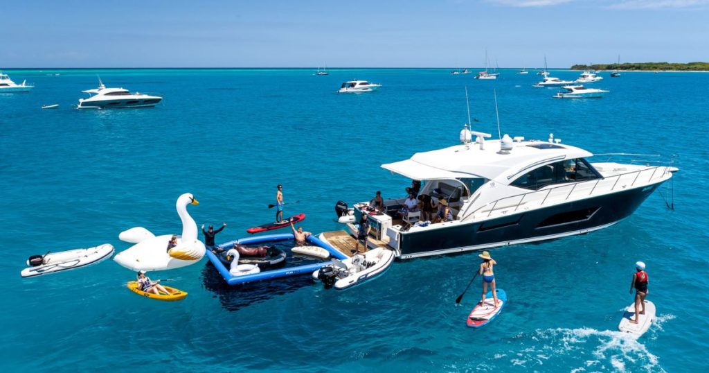 FunAir Lagoon Pool with yacht toy inflatables and charter guests enjoying watersports in Australia