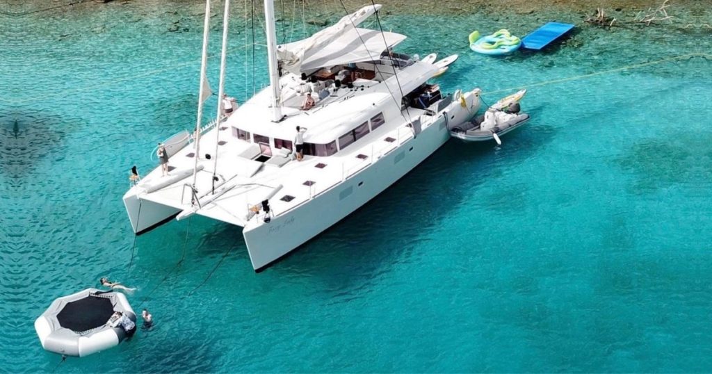 Yacht Foxy Lady catamaran with water toys and inflatable trampoline