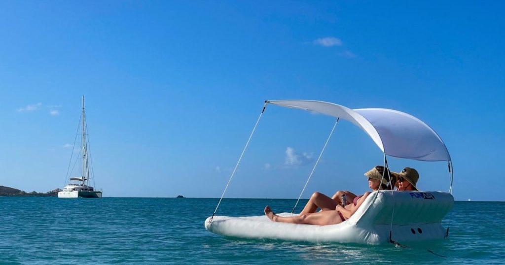 Two ladies on a FunAir Shaded Lounger admiring the views in the Caribbean