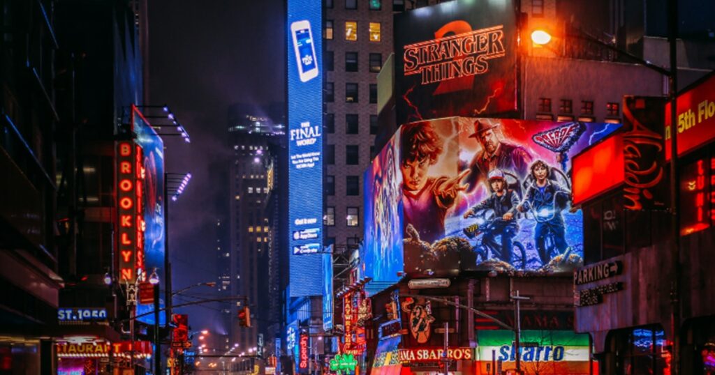 Stranger Things billboard and city lights for Halloween party