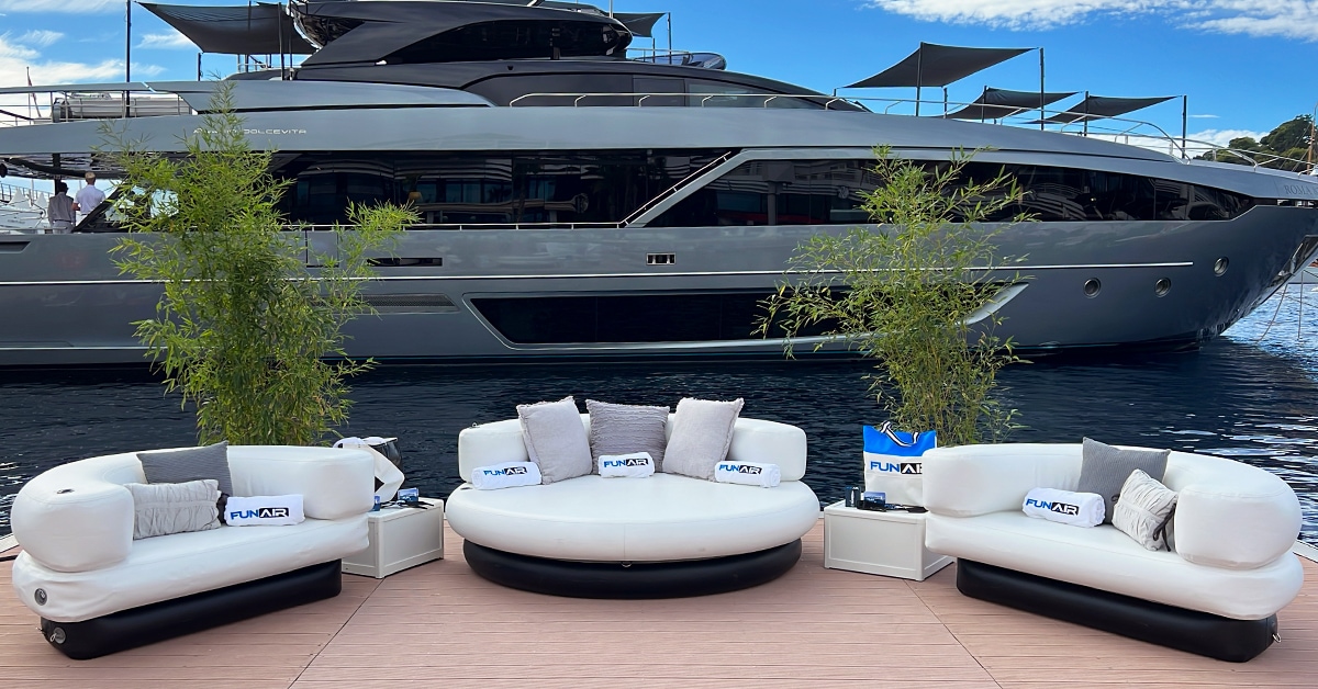 New FunAir inflatable beach furniture the Club Chaise and Club Chair in front of Superyacht Dolce Vita
