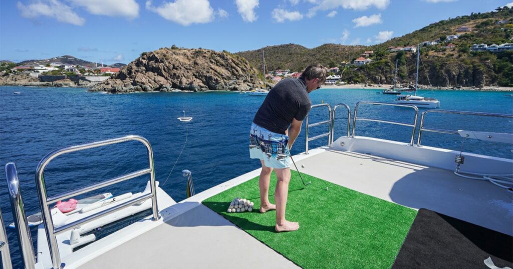 Man using FunAir Yacht Golf on a luxury motor yacht