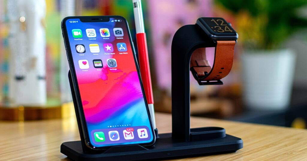 iPhone and Apple Watch on charging stand