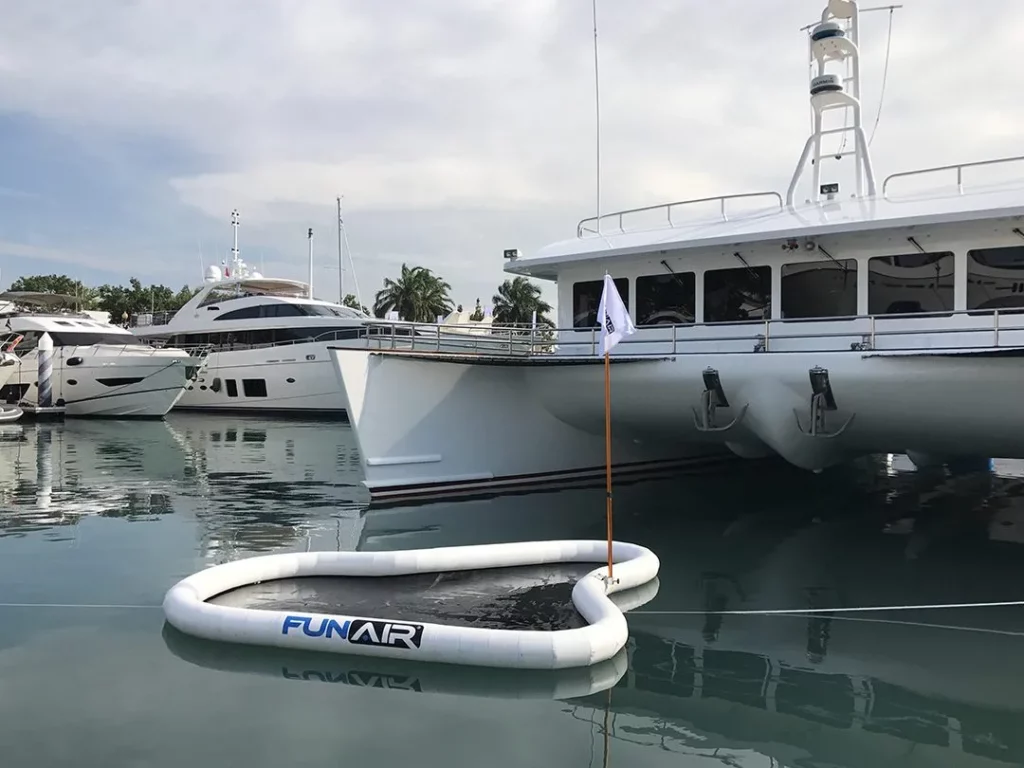 FunAir floating golf green in front of superyachts