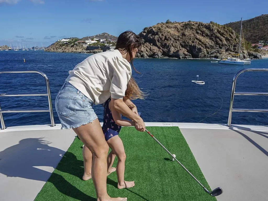 Woman and child enjoying FunAir Yacht Golf