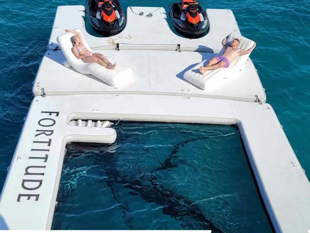 FunFlex Sea Pool Wave Loungers MY Fortitude with charter guests