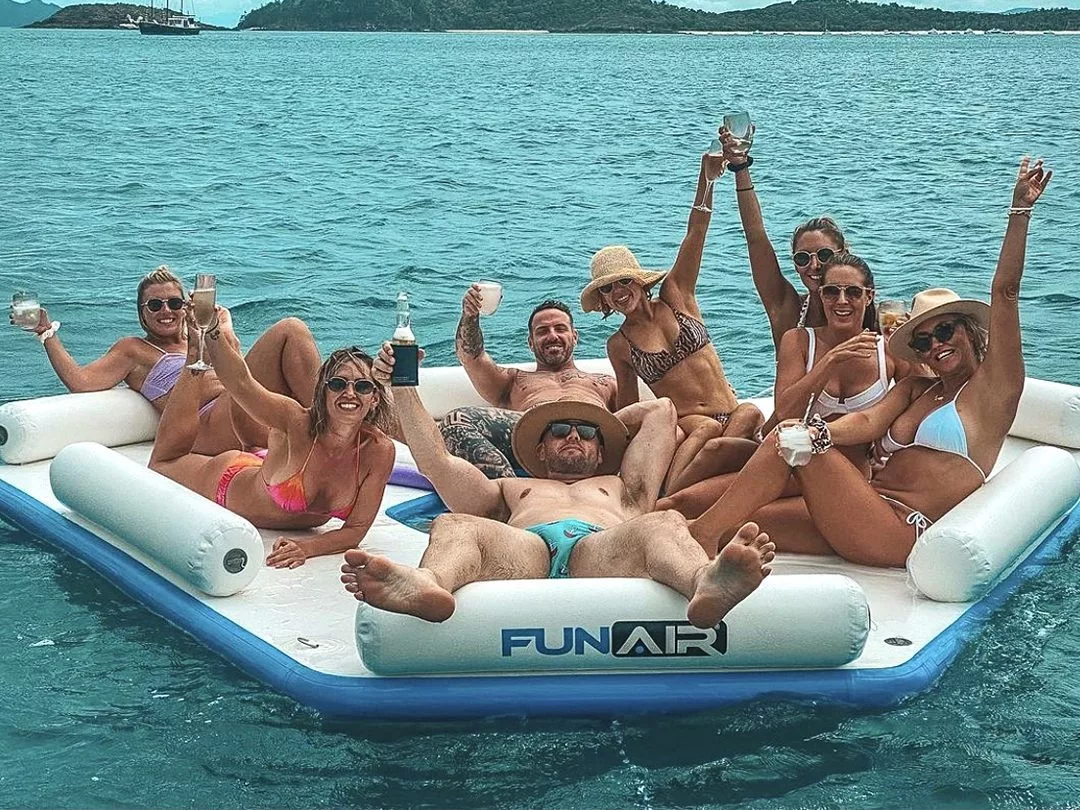 Charter guests enjoying a party on a Splash Island