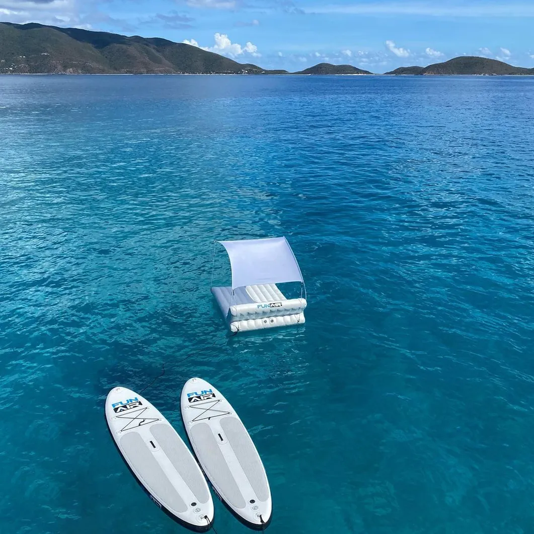 Floating Shaded Lounger and SUPs from superyacht Foxy Lady