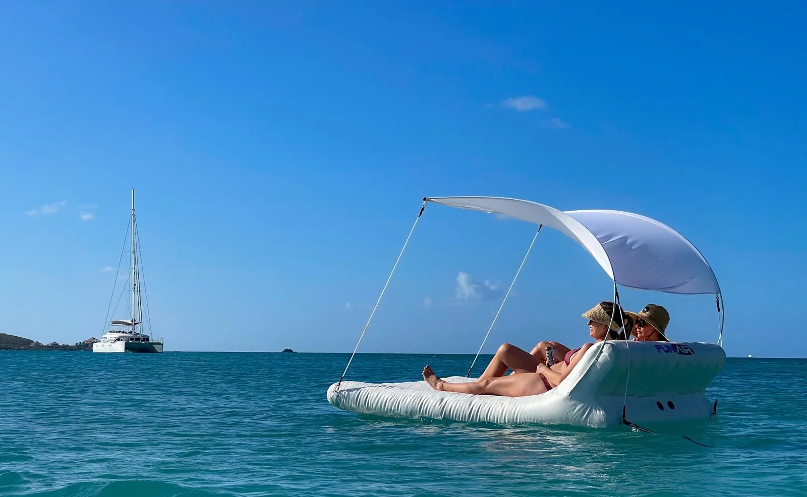 Floating Shaded Lounger from charter superyacht Foxy Lady