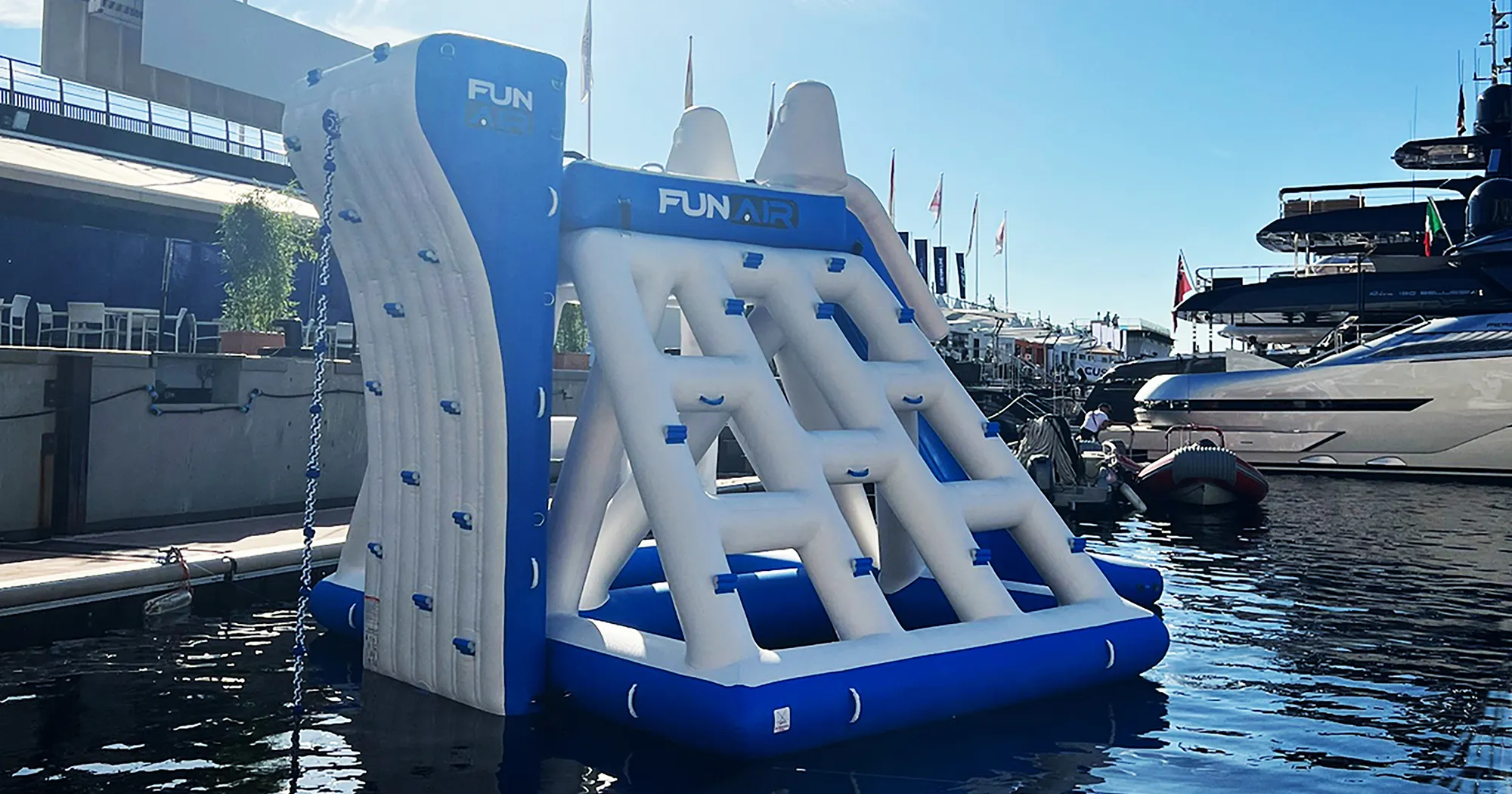 FunAir Climbing Playground in front of a superyacht at the Monaco Yacht Show 2023