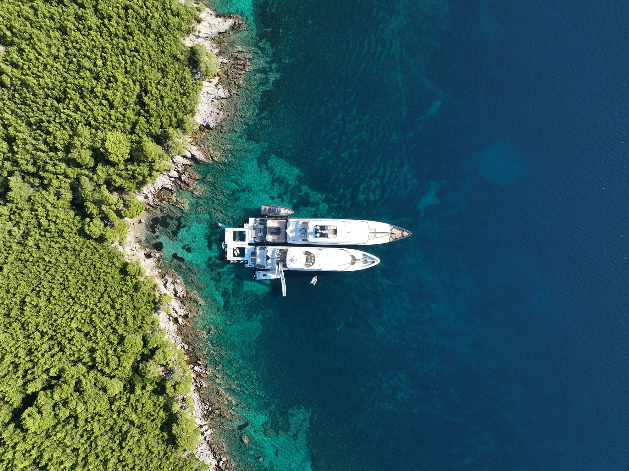 Sea Pool Yacht Slide Loungers MY Loon 221 and Loon 180 in tandem in Croatia drone view of anchorage