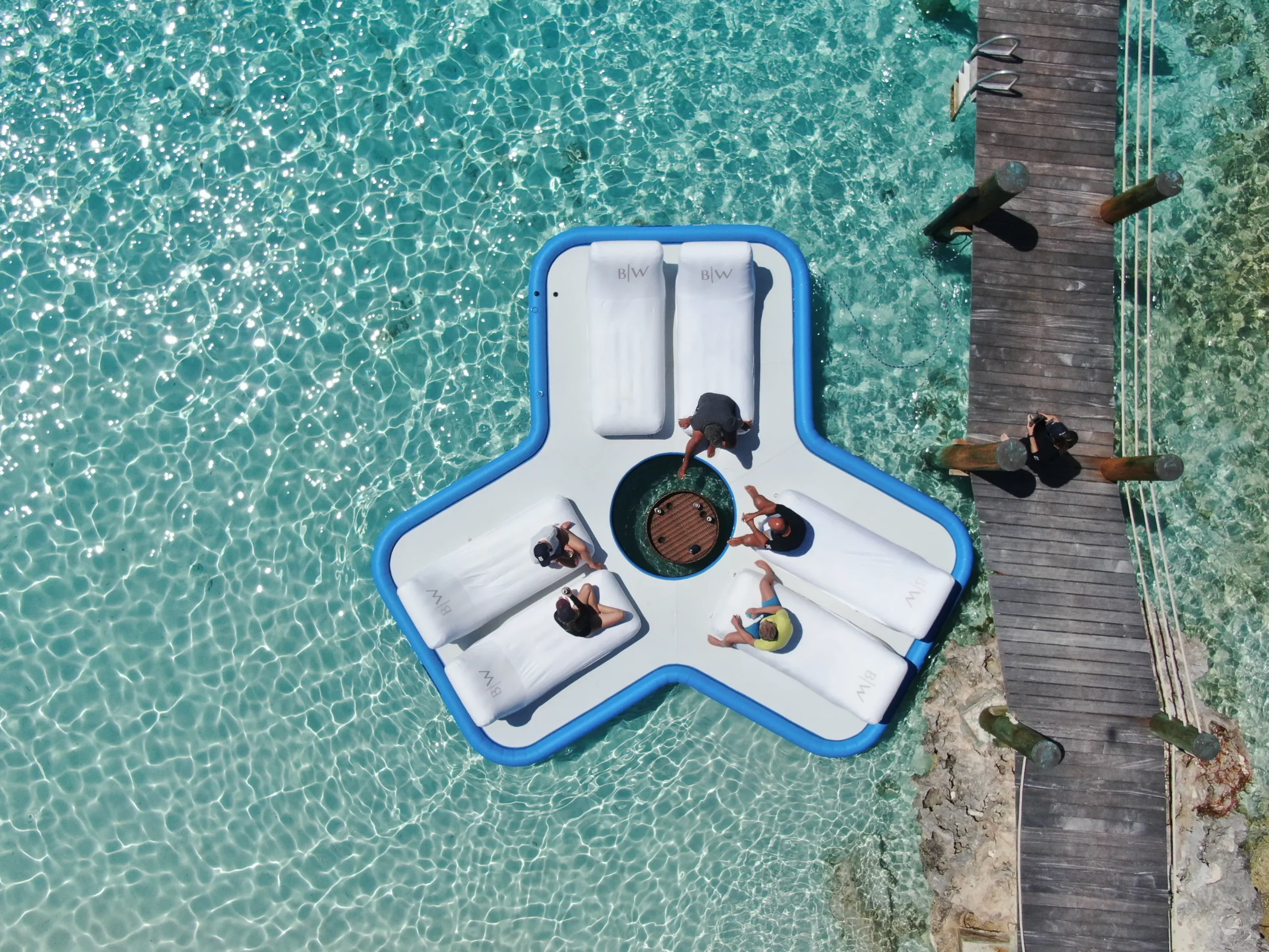 Superyacht charter guests on the Inflatable Floating Island from MY Broadwater