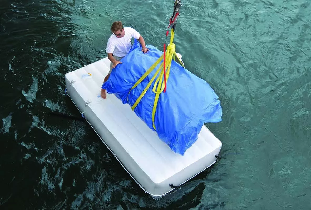 Superyacht crew member using a FunAir Work Platform