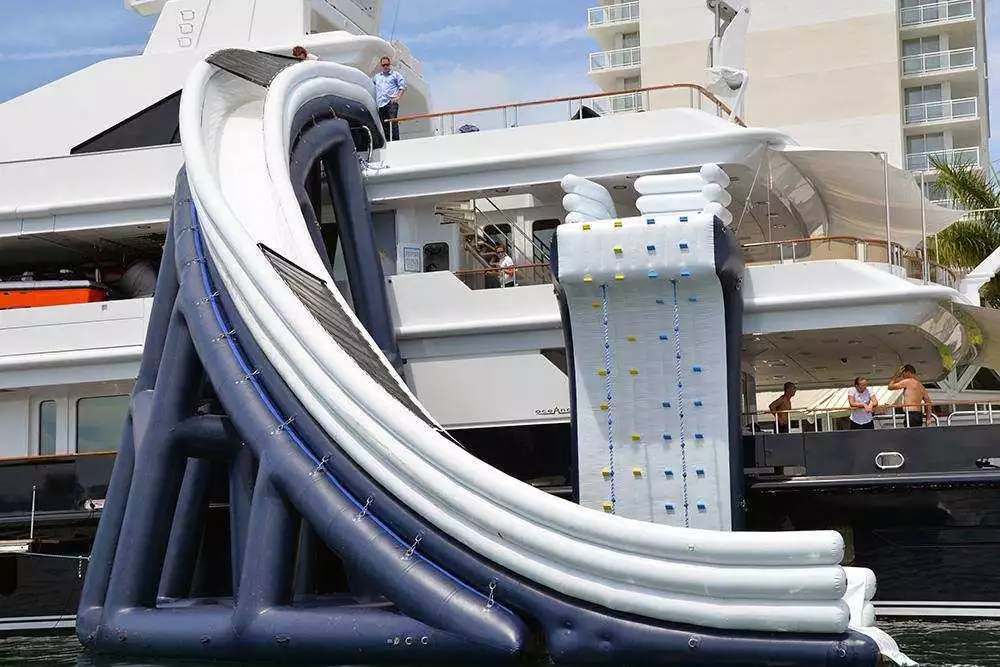 The Curved Yacht Slide on charter superyacht MY Helios