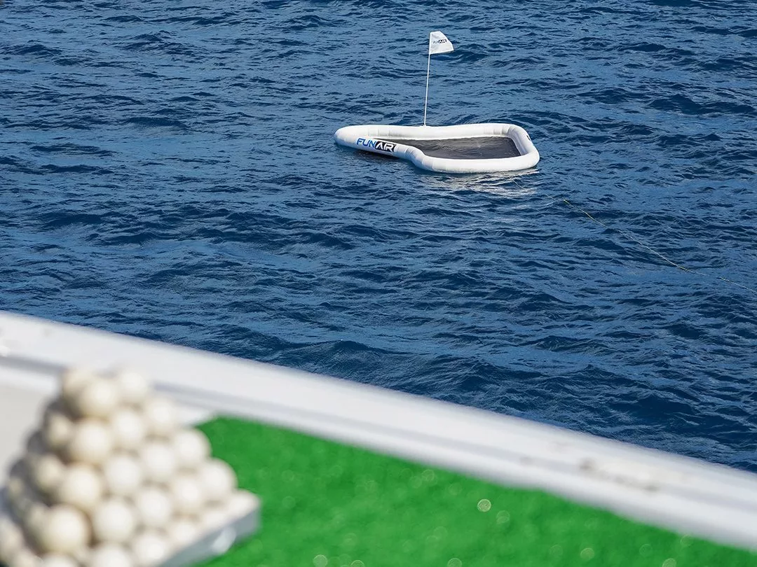 The Yacht Golf Floating Green and Albus eco friendly fish food golf balls