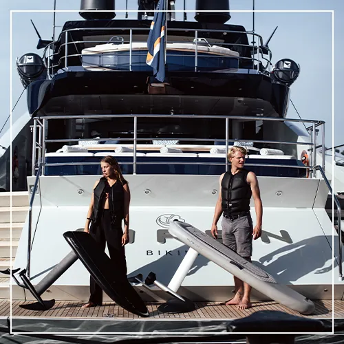 Charter guests from a luxury yacht with Fliteboards