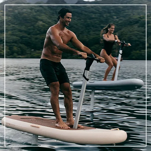 Charter guests riding Fliteboards