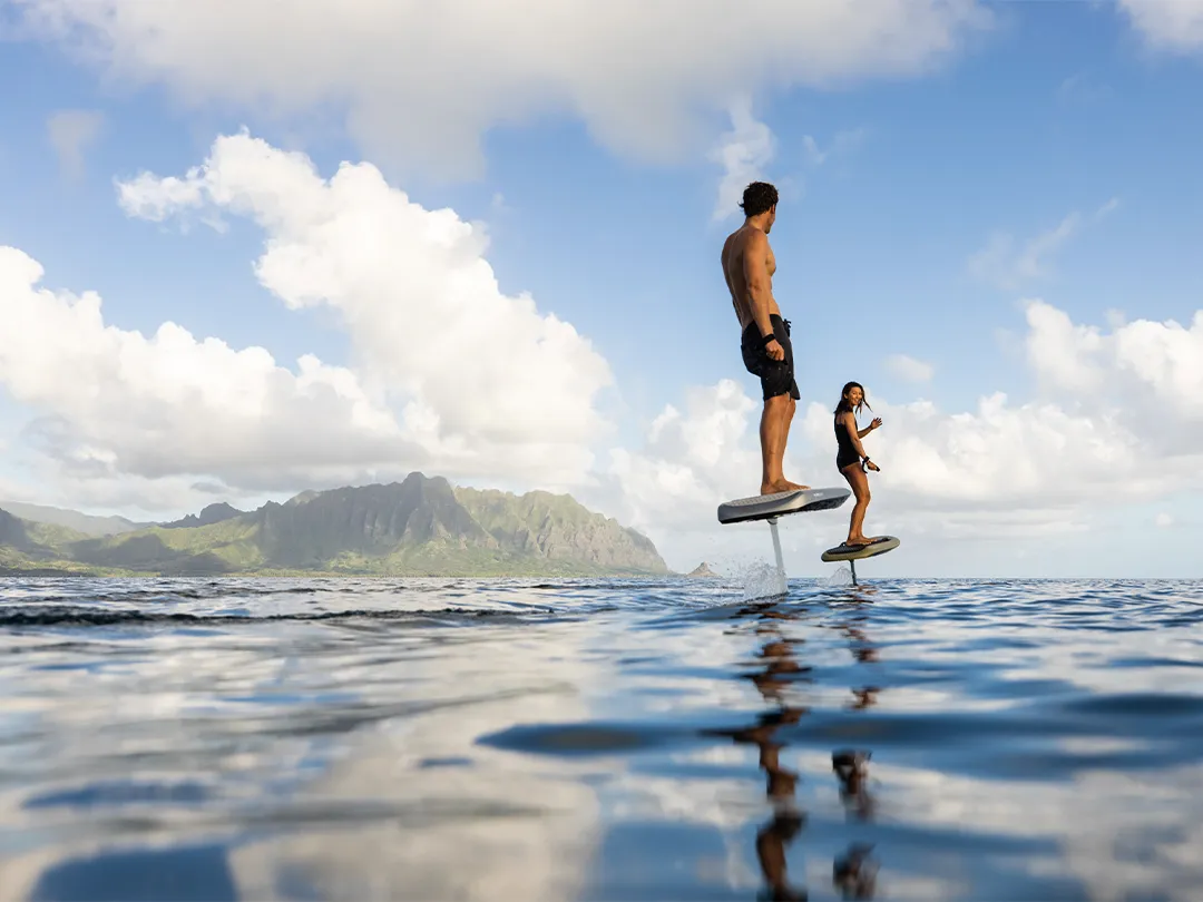 Guests riding Fliteboards during their superyacht vacation