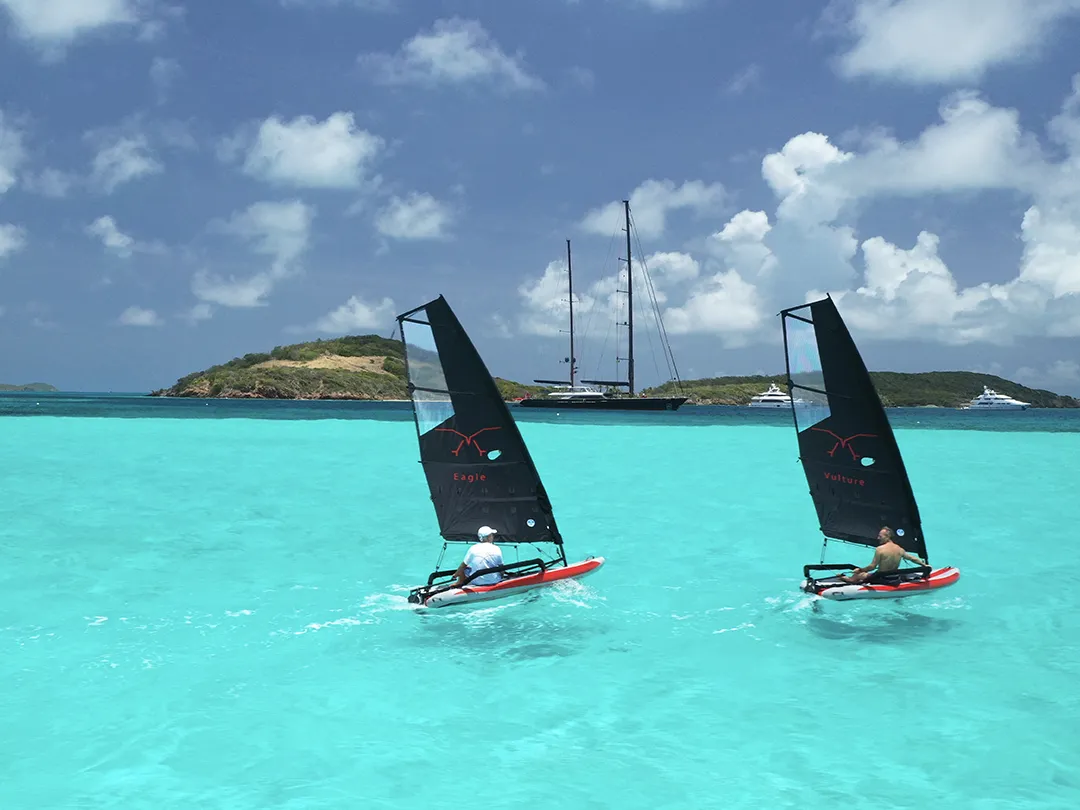Tiwal inflatable dinghies in crystal clear azure ocean