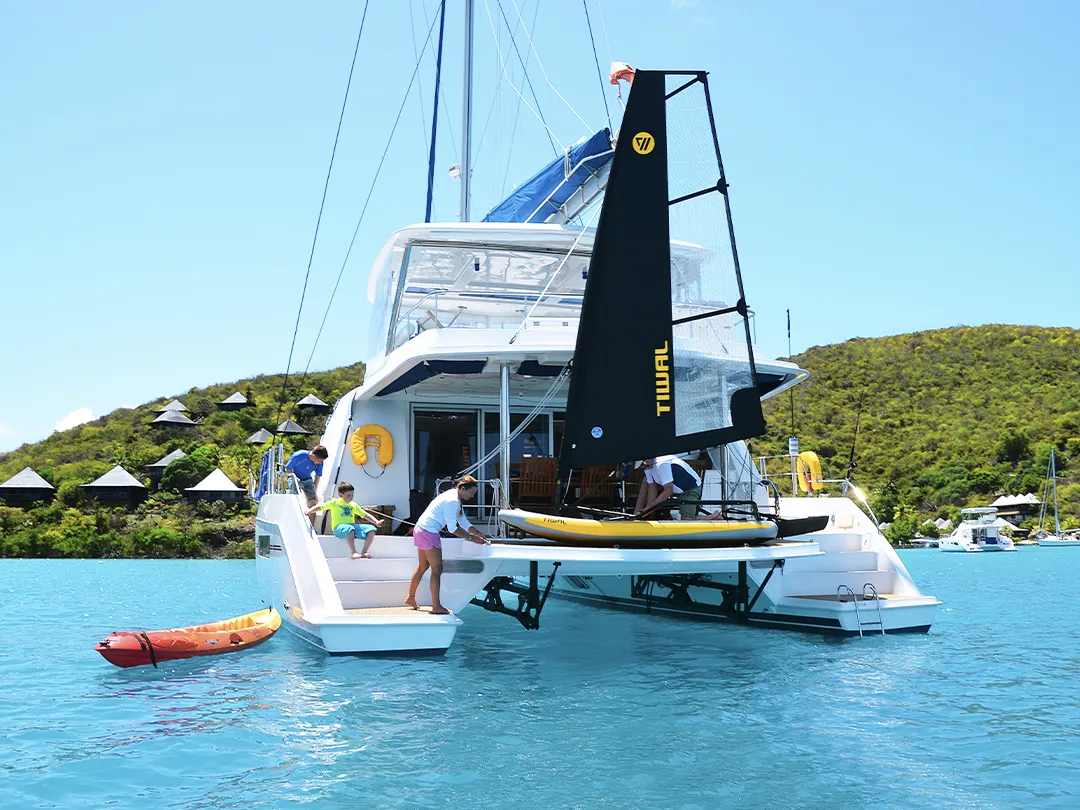 Tiwal inflatable dinghy on the aft of a catamaran