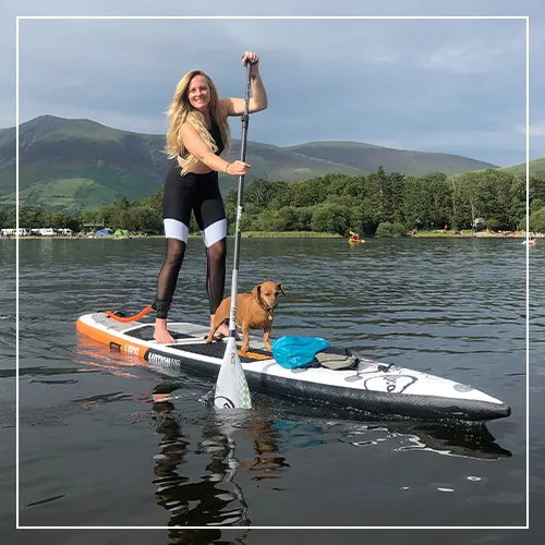 Charter guest enjoying a paddle on a Loco SUP