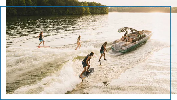 MasterCraft-tender-with-charter-guests-wake-boarding