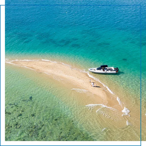 Tender from charter superyacht Impulsive on a sand bay on the Australia coastline