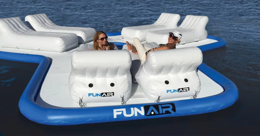 Superyacht charter guests relaxing on a FunAir Floating Island