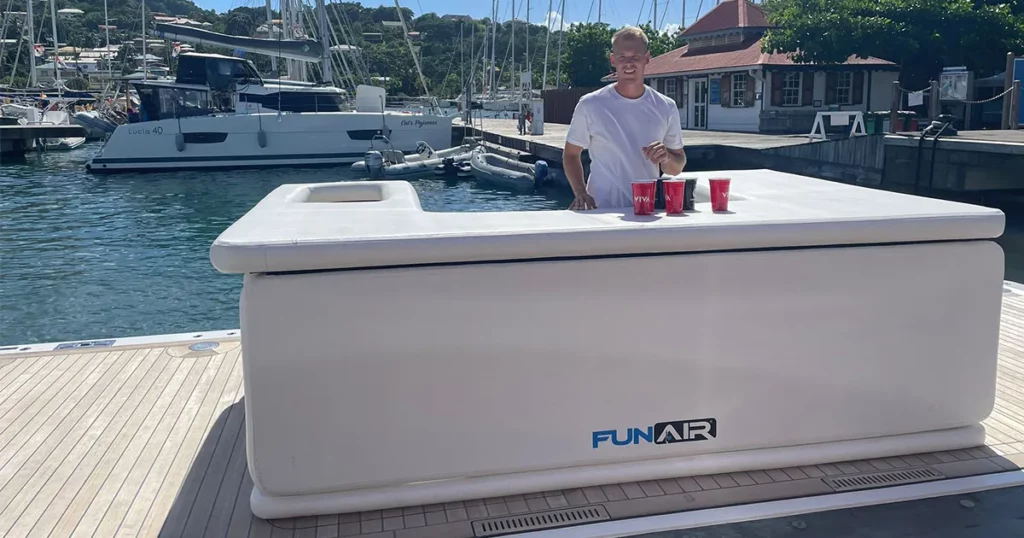FunAir Beach Bar from charter yacht MY Viva with crew member set up on dockside