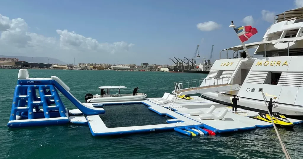 The FunAir super dock sea pool playground and wave loun gers on charter superyacht Lady Moura