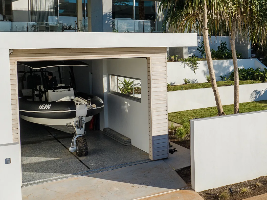 A Sealegs tender stored in a garage