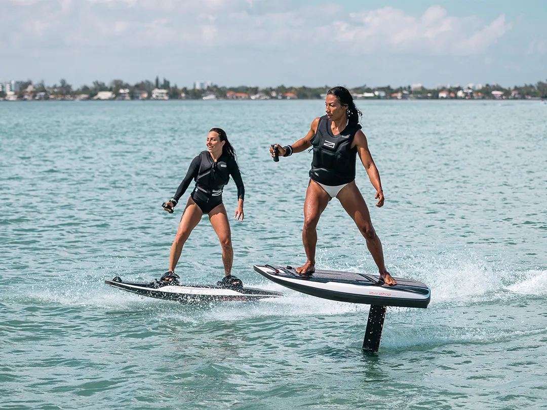 superyacht charter guests riding Awake Boards yacht toys