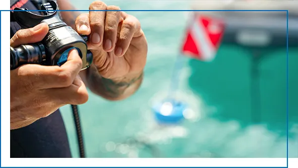 A yacht guest training to use the BLU3 diving equipment.