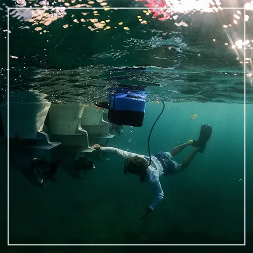 Charter guest from a superyacht using a BLU3 diving system
