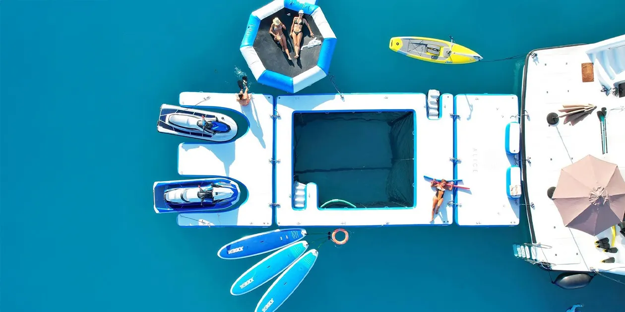 The FunAir FunFlex Sea Pool and Jet Ski Dock with Floating Bouncer on charter yacht MY Alice