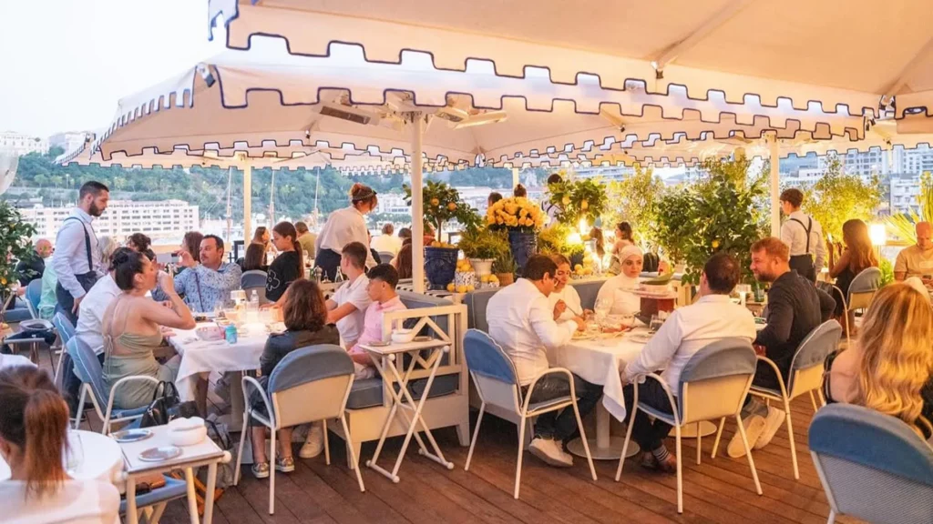 Monaco Yacht Show visitors dining at La Môme Monte-Carlo