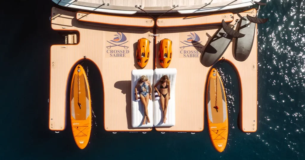 charter guests from MY Crossed Sabre relaxing on FunAir superyacht inflatables